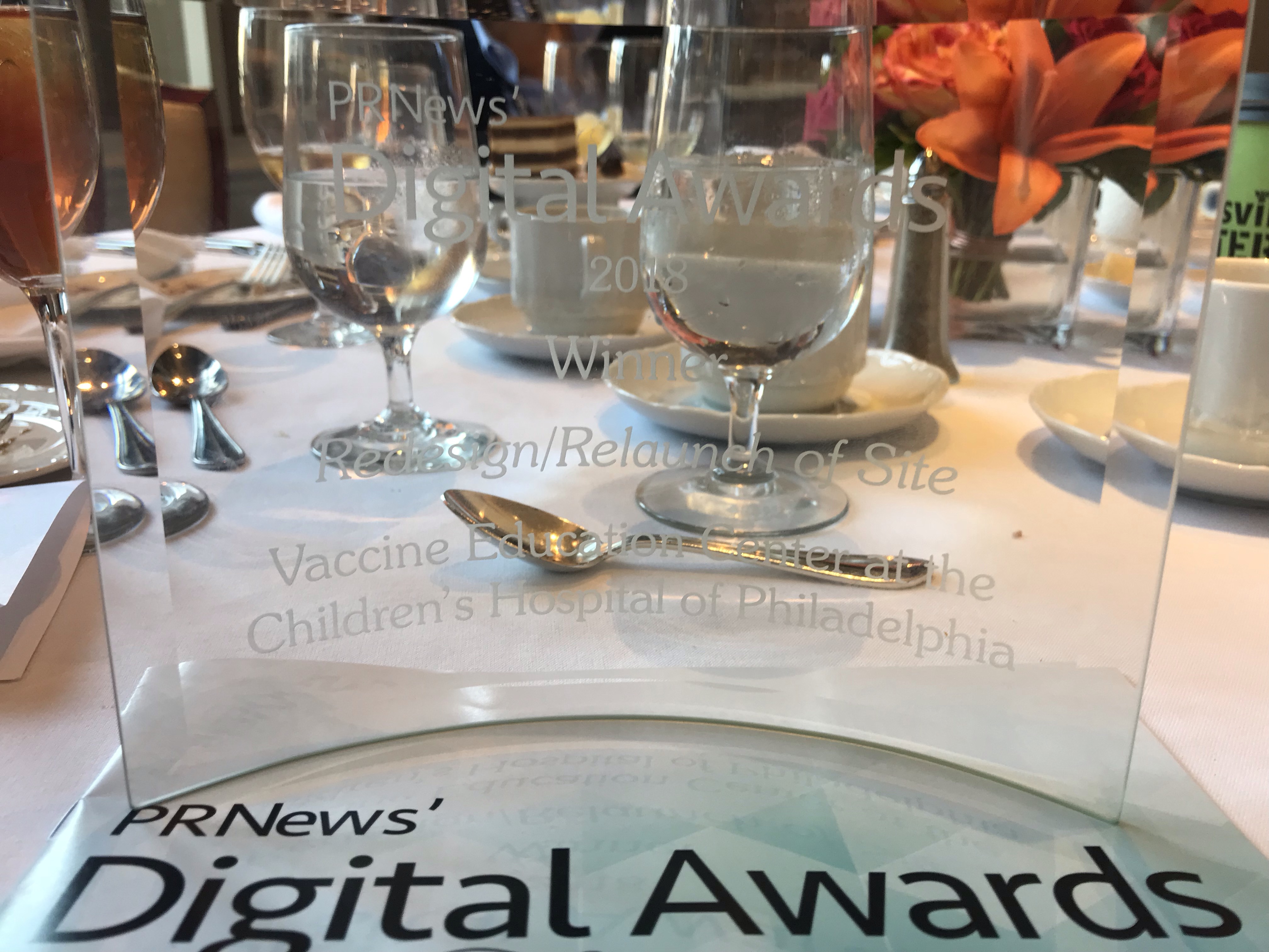 PR News Award PR News Digital Award on a table.