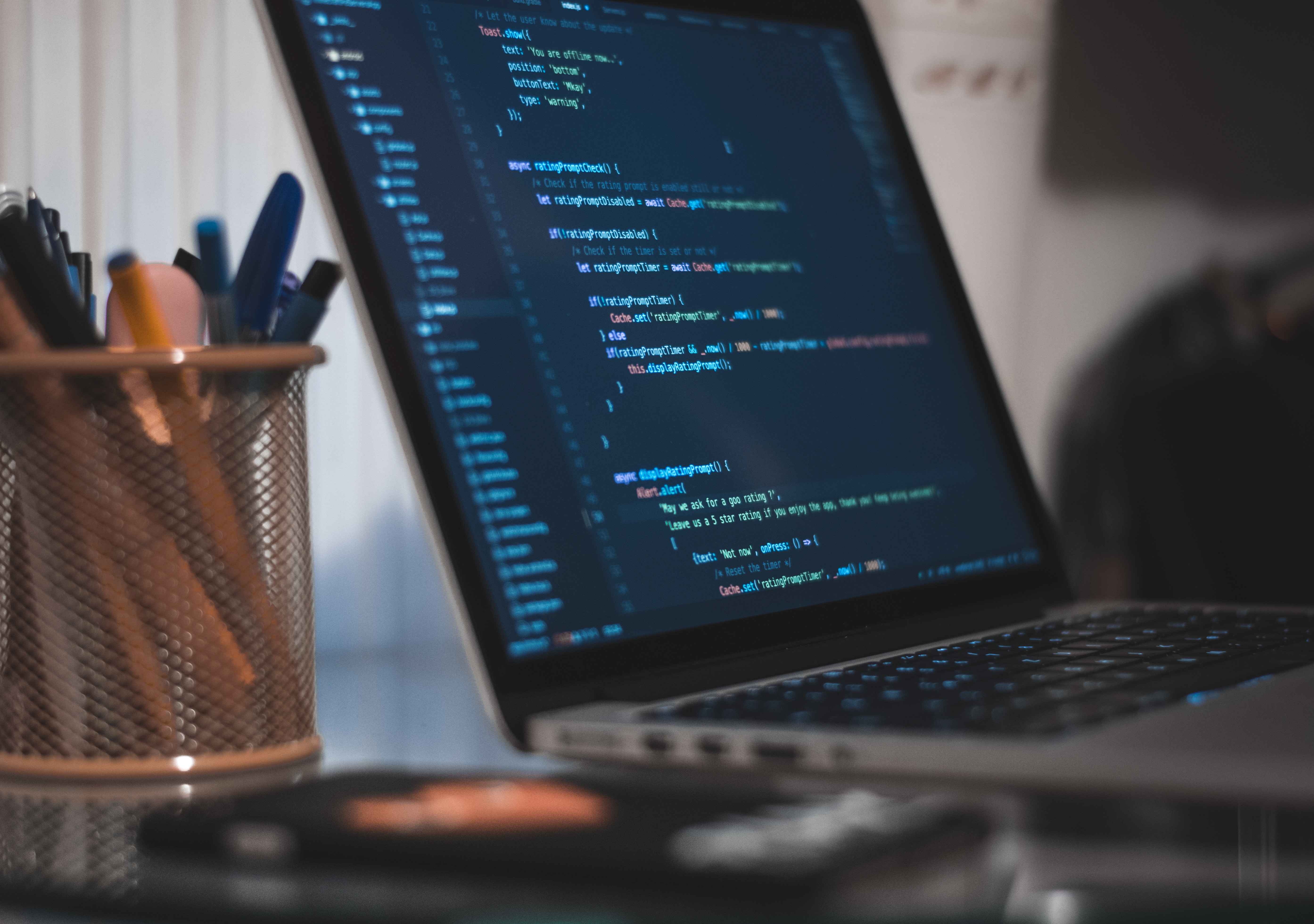 Laptop screen with coding