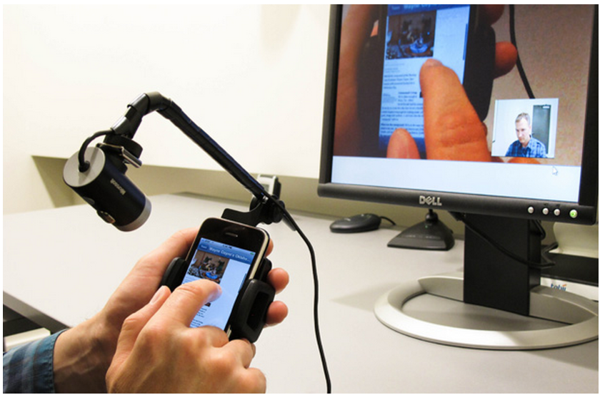 A man testing something on a phone.