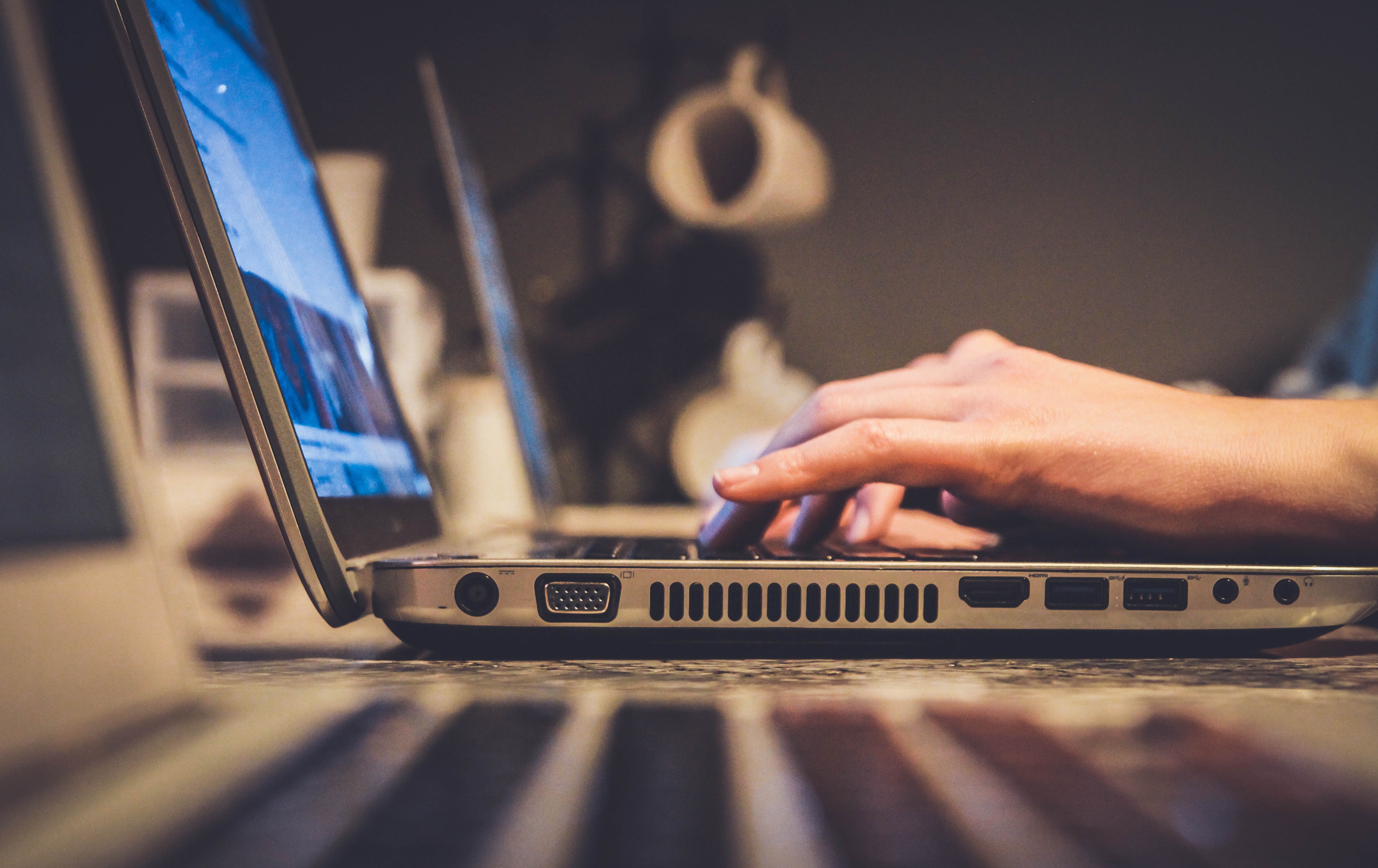 Typing on a silver computer