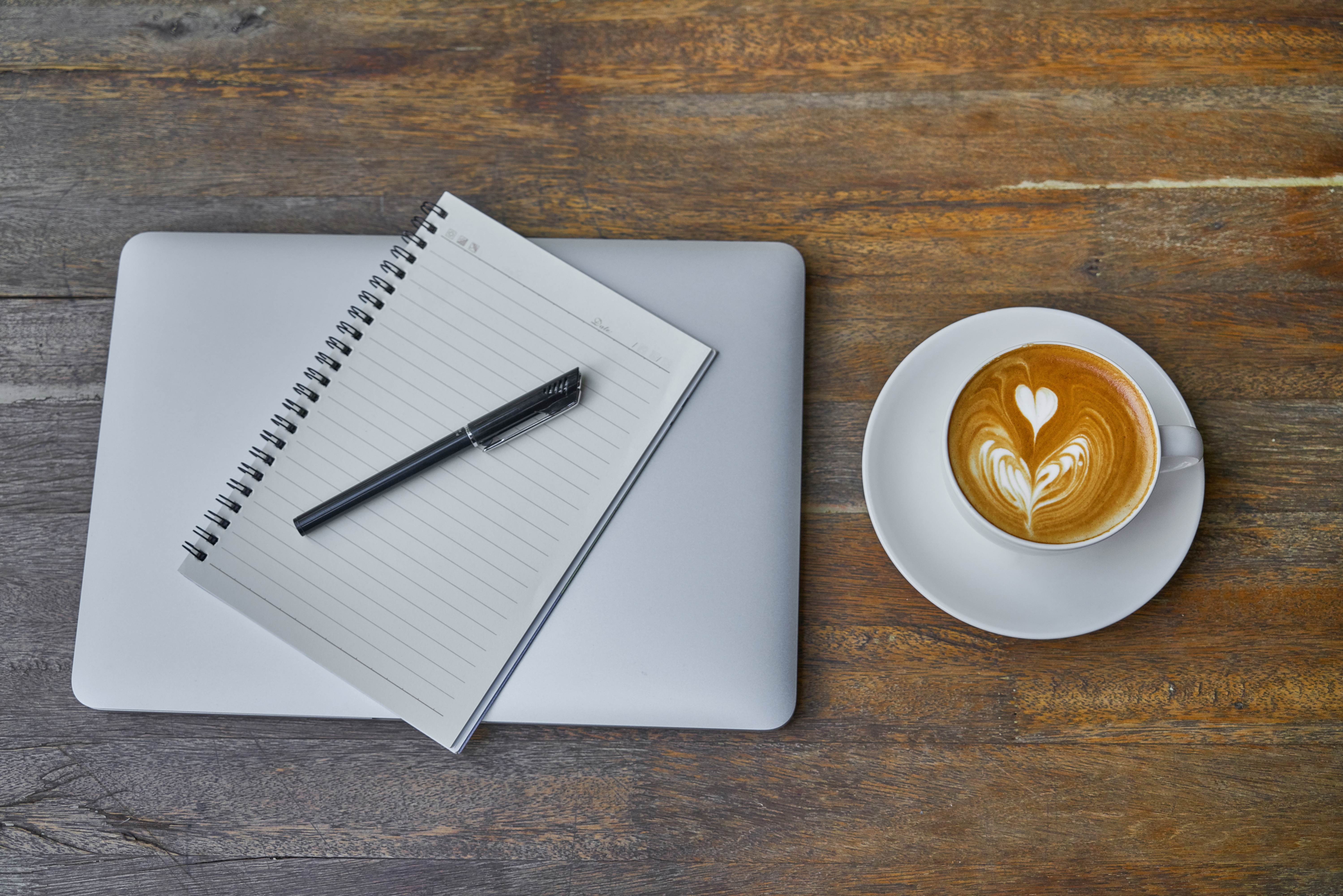 Notebook and coffee