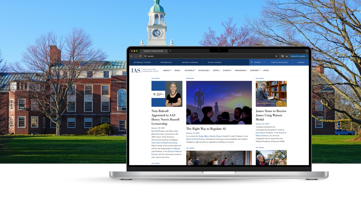 Photo of IAS main campus building with a laptop showing the website homepage